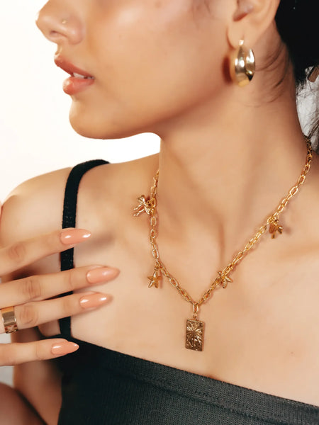 Golden Sunburst Charm Necklace